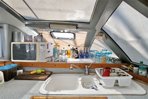 Catamaran galley is U-shaped and situated adjacent to the salon